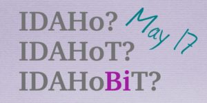 On a piece of paper, the acronyms "IDAHo? IDAHoT? IDAHoBiT?". They're all in grey, except that the "Bi" part of "IDAHoBiT" is bright purple. To the side, handwriting adds "May 17".